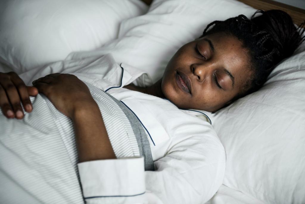 A woman sleeping soundly. The Power Of Artificial Intelligence On Human Sleep.