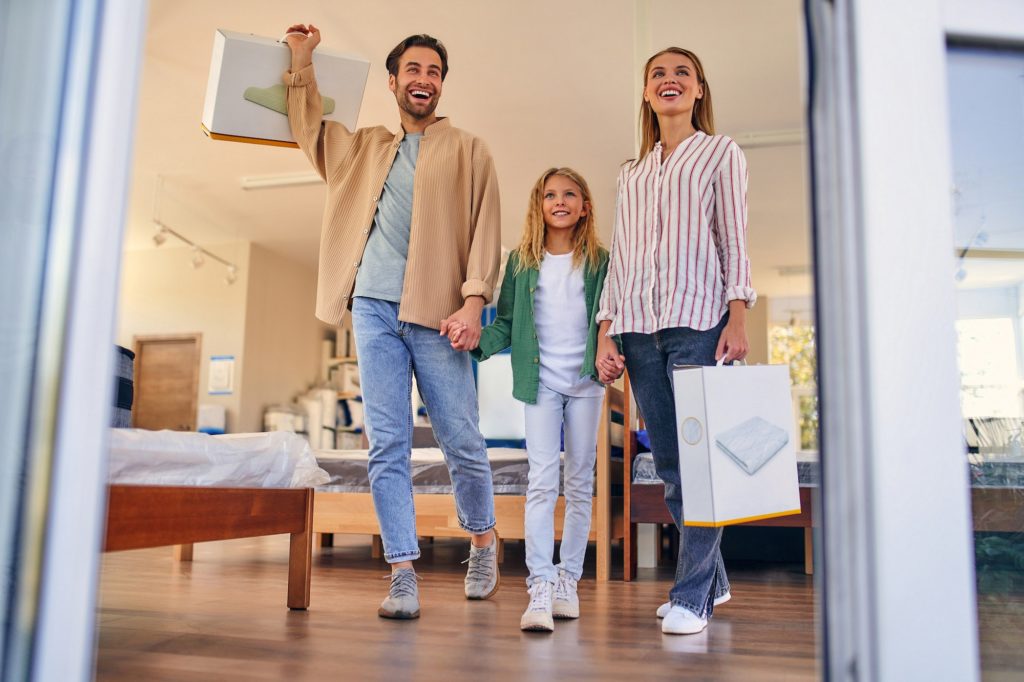 Family happy after learning more about split box springs.