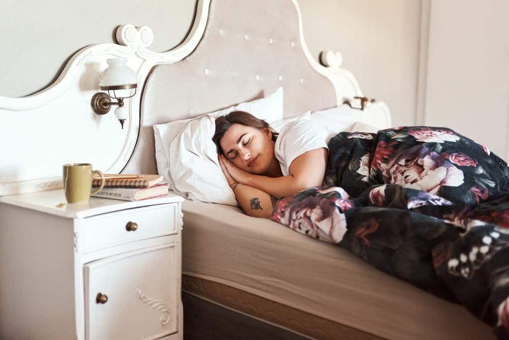 Good health starts with good sleep. Cropped shot of a young woman sleeping in her bed.