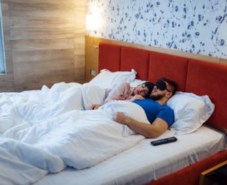 Couple getting a healthy night of sleep.