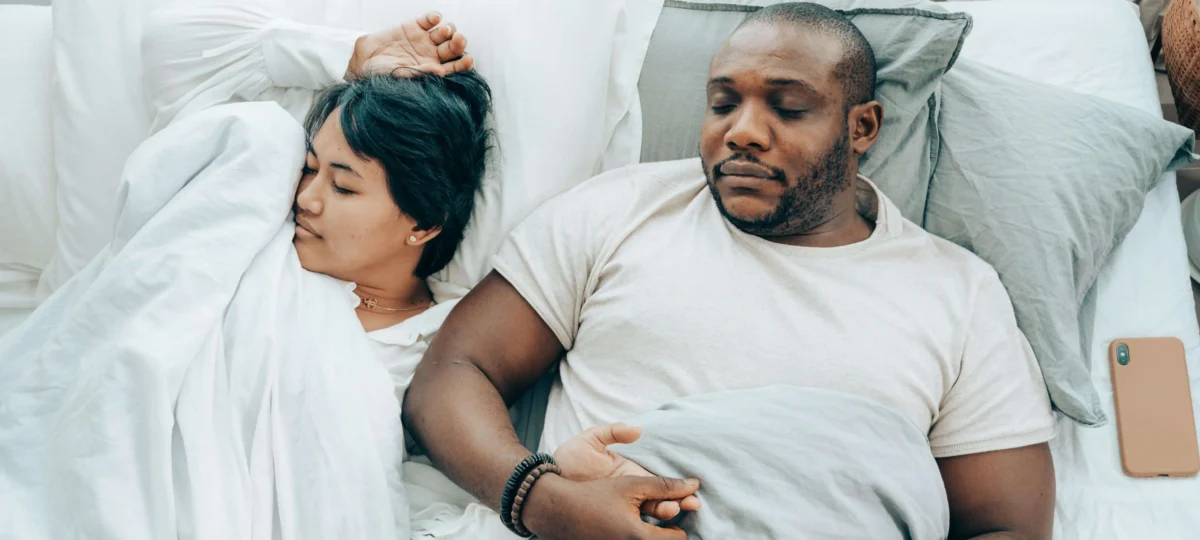 two heavy people on a mattress